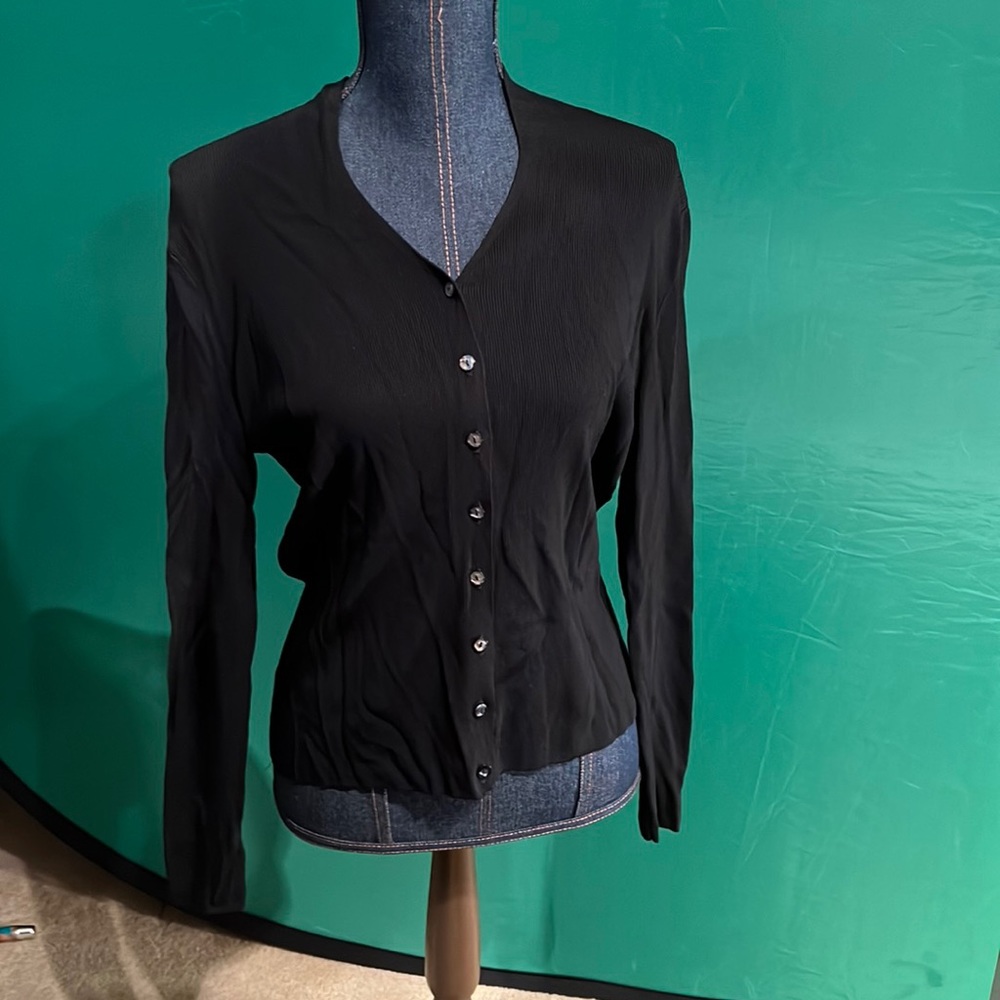Black cardigan with mother of the pearl like buttons